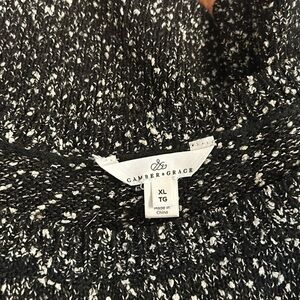 Cozy up for the cooler months in this sweater dress